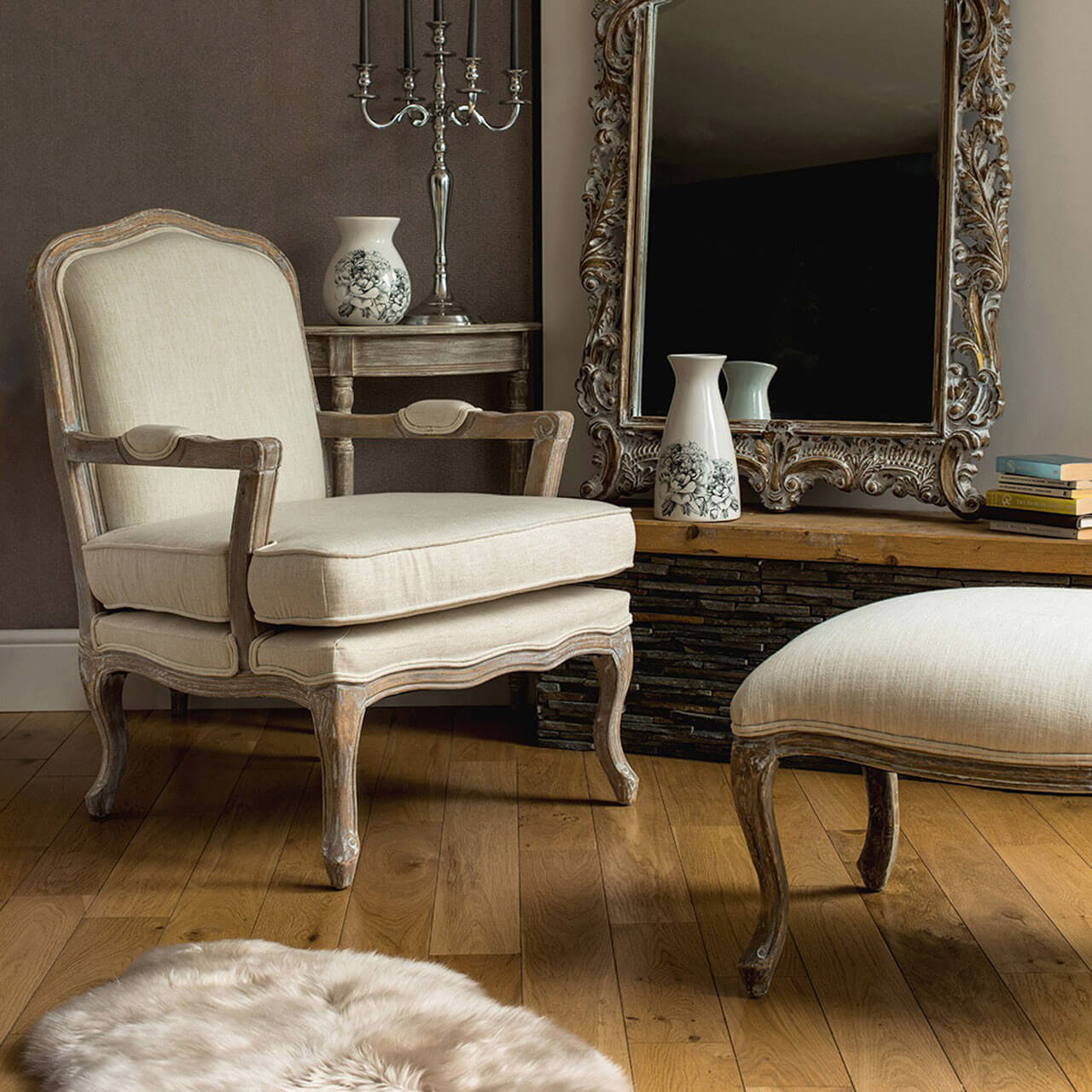 grey armchair with footstool